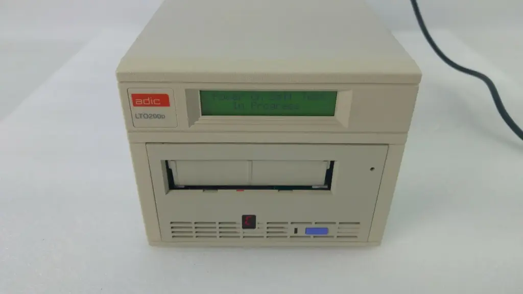 ADIC LTO200D external tape drive, front display reading Power On Self Test In Progress