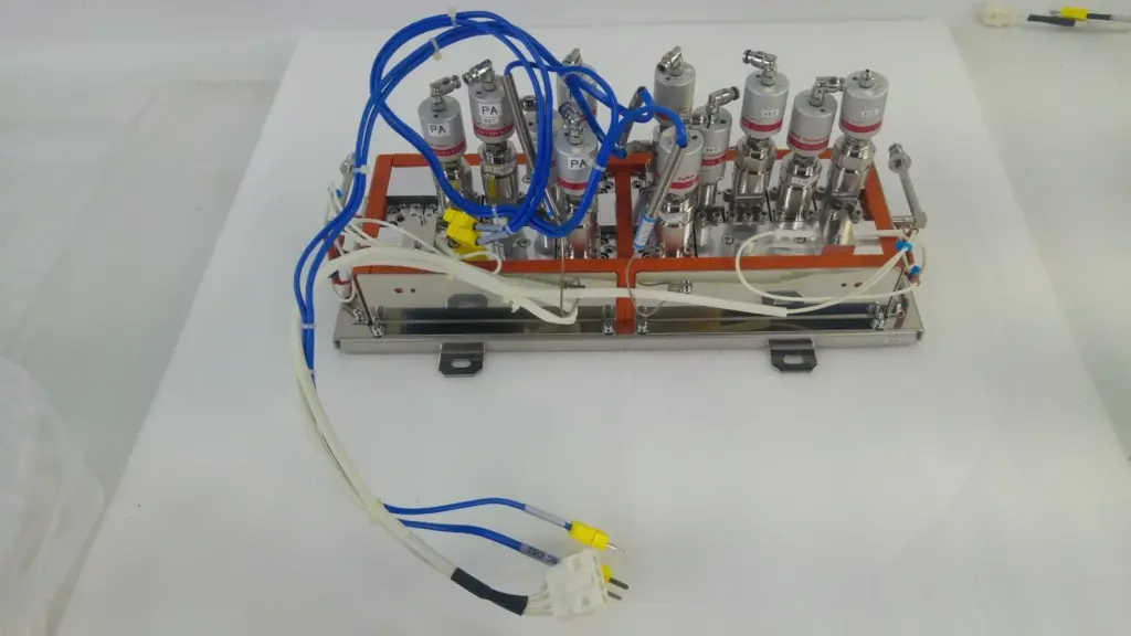 ASM gas box 1091-082-01 with Fujikin pneumatic valves, orange silicone jacket and wiring