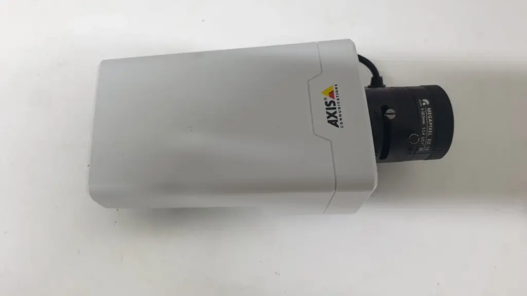 AXIS M1124 network camera in white housing with Ricom varifocal lens, side view
