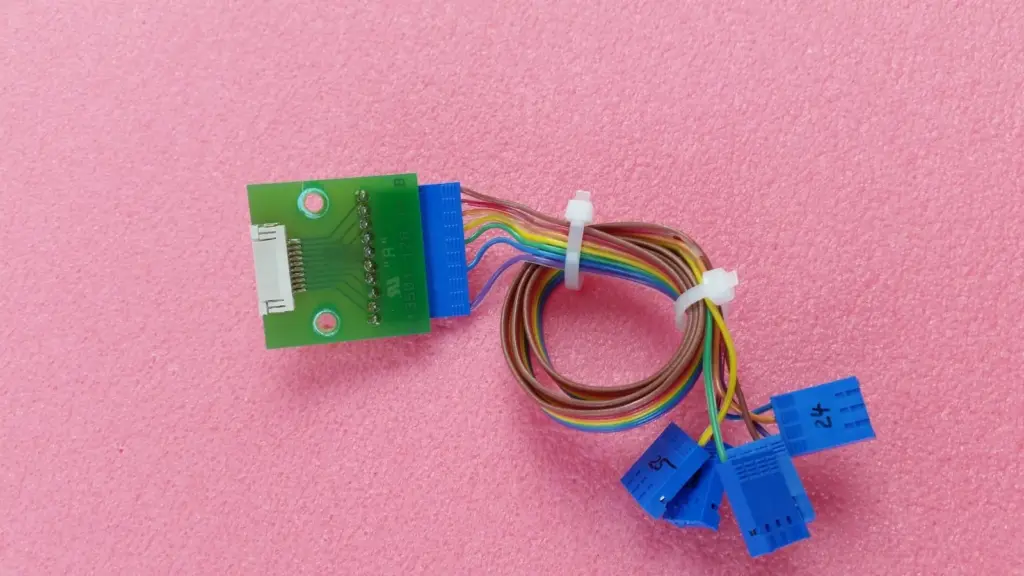 Brooks 013501-128-17 B interface board with rainbow ribbon cable and blue connectors