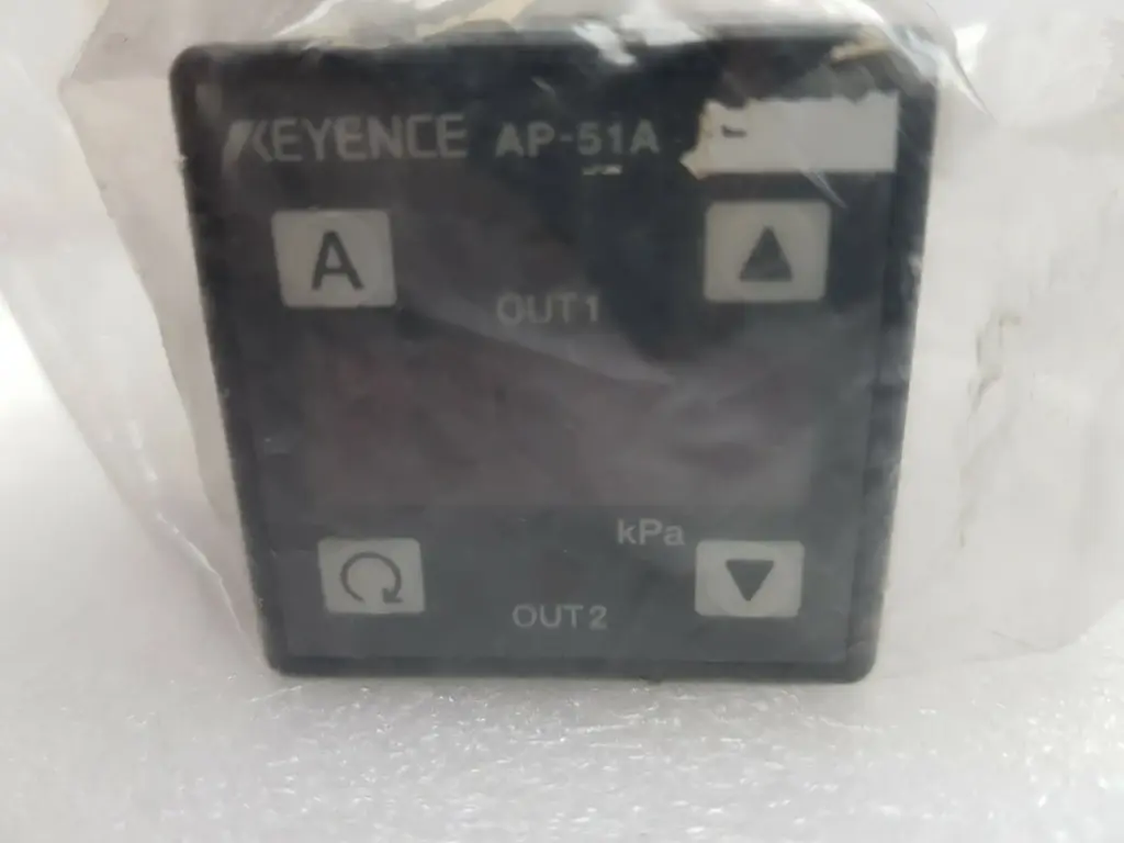 Keyence AP-51A pressure sensor front with A, up, down and reset keys, OUT1 and OUT2 indicators, kPa display
