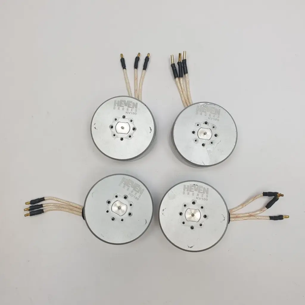 Four used HEVEN DRONES KV100 brushless motors with three-wire plug leads