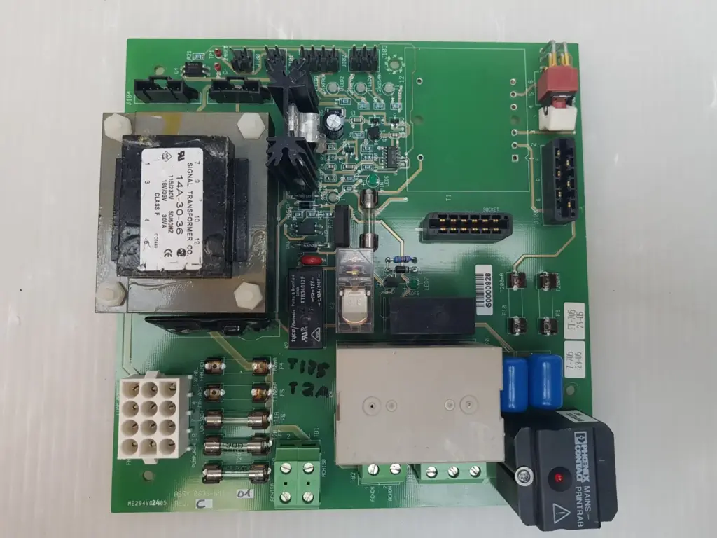 Lumenis 0633-641-01 Rev C board with the T1 transformer position empty and a Phoenix Contact surge module