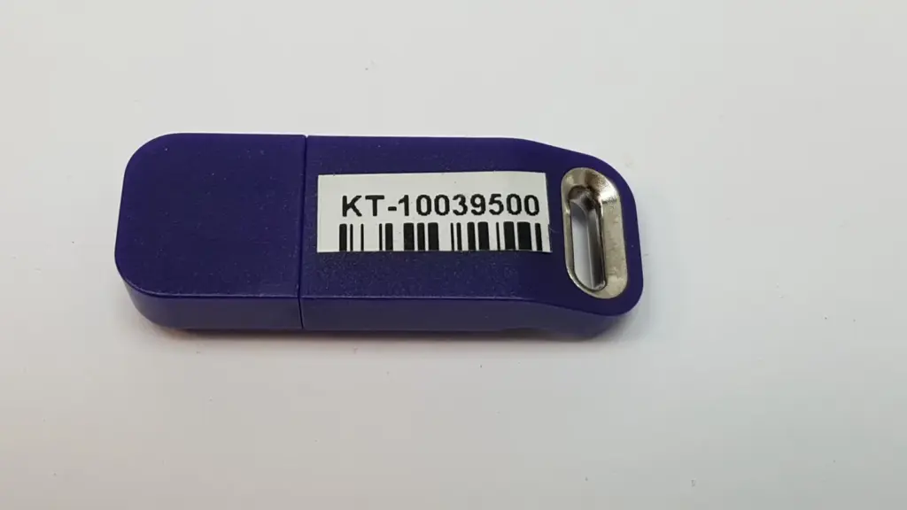 Lumenis KT-10039500 upgrade HASP, purple USB key with barcode label
