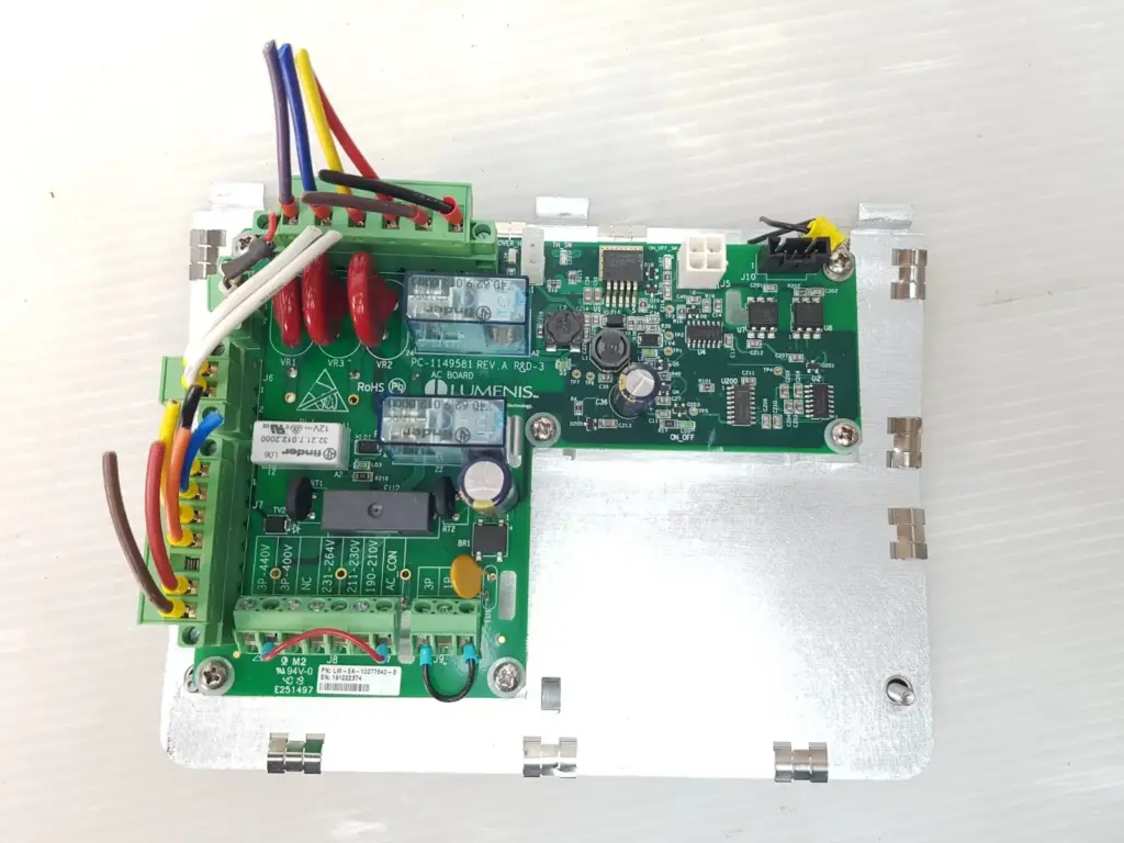Lumenis LM-EA-10077840-B AC board PC-1149581 on its aluminium mounting plate, with wiring leads