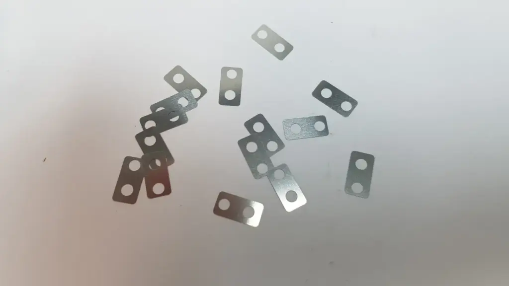 Lumenis MM-003793 slide surfaces: small rectangular metal plates with two holes