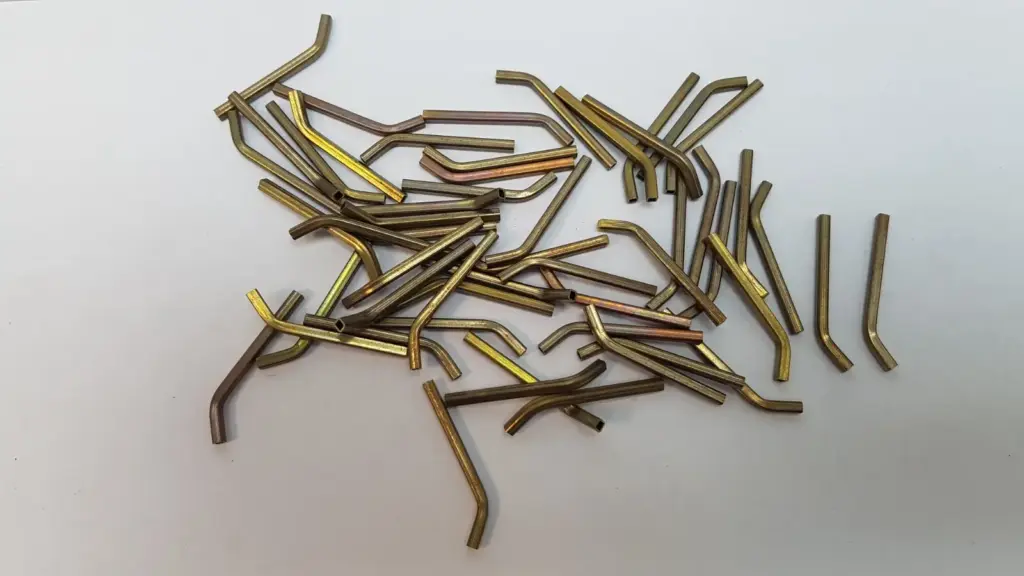 Lot of 53 Lumenis MS-10032400 EPI cooler tubes, brass-coloured and bent near one end