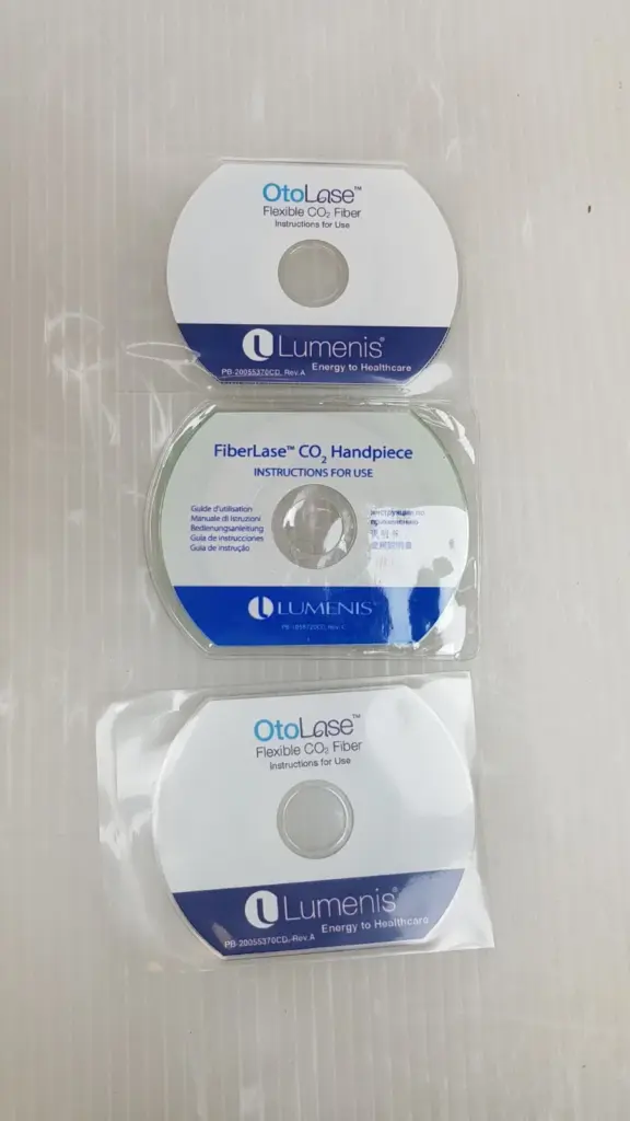 Three Lumenis instructions-for-use discs in clear sleeves: two OtoLase and one FiberLase CO2 Handpiece