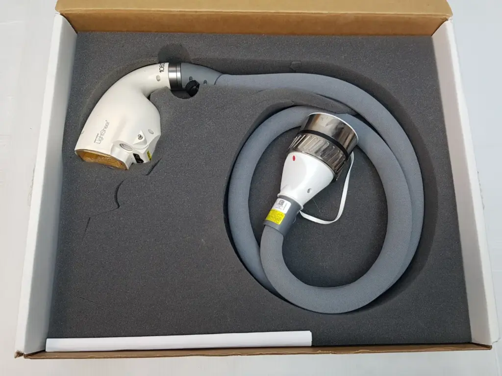 Lumenis RSA-10030710 LightSheer 1060 handpiece and cable in a foam-lined box