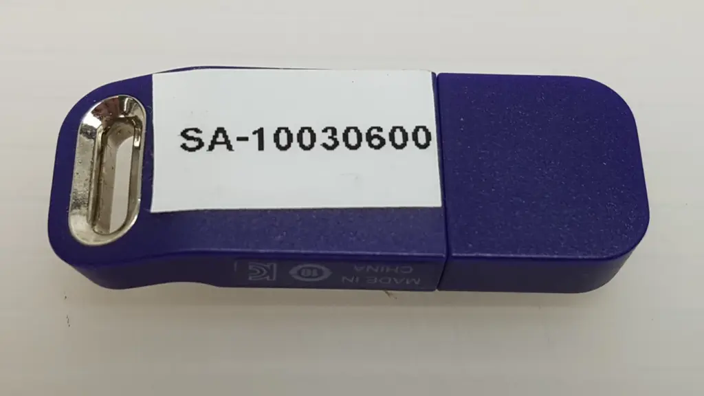Lumenis SA-10030600 purple USB HASP key with part-number label