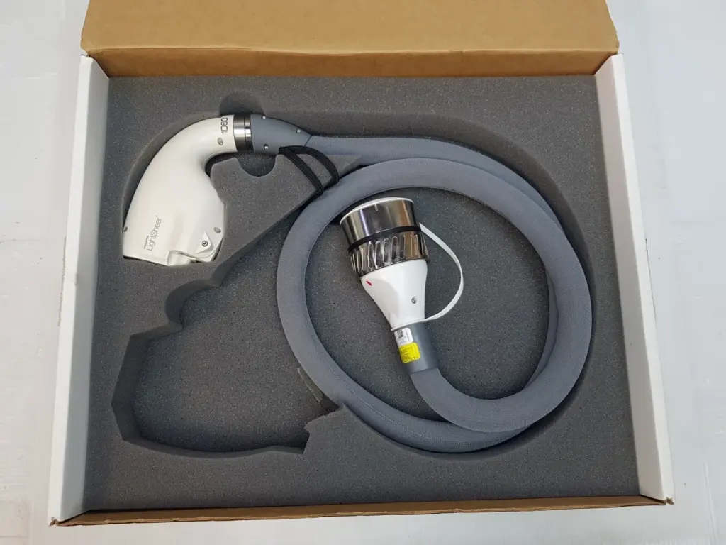 Lumenis SA-10030610 LightSheer 1060 handpiece and umbilical cable in a foam-lined box
