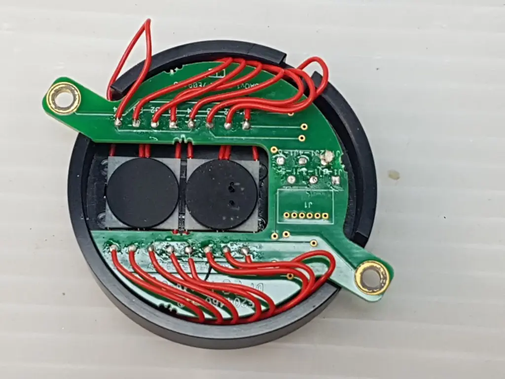 Ophir 7E09488 PCB assembly in round black housing with red wiring and two sensor elements