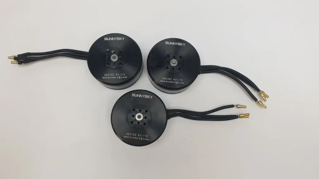 Three SunnySky X6215S KV170 brushless drone motors with leads and gold bullet connectors