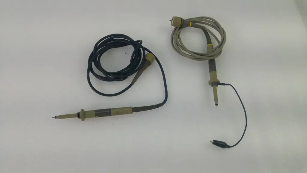 Two used Tektronix P6109 oscilloscope probes, one with a black cable and one with a grey cable