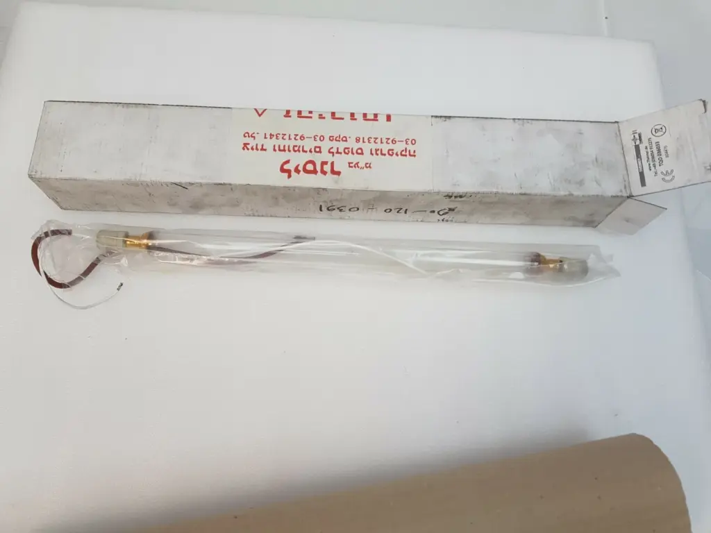 Theimer TQO 036033 tubular lamp in its plastic sleeve in front of its original box
