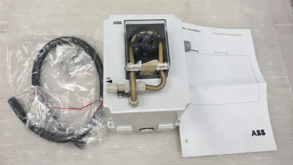 ABB CGKA 2 automatic condensate drain with tubing, hose clamps and German manual