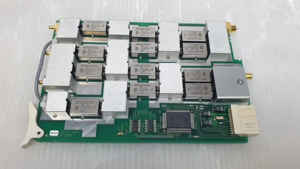 Agilent E3120-66512 pin board with twelve Sanyu relays, aluminum shields and coax connectors