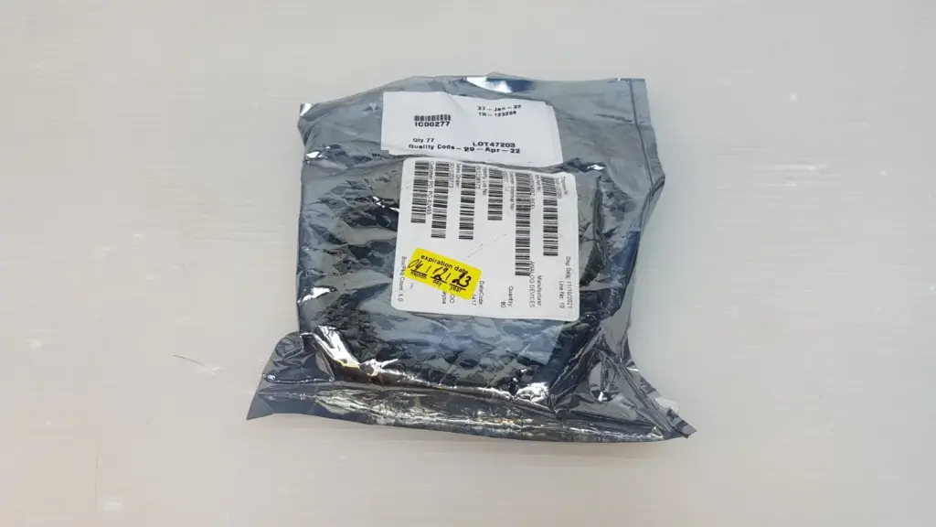 ESD bag of Analog Devices ADG507AKRZ-REEL multiplexers with stock label Qty 77 and yellow expiration sticker
