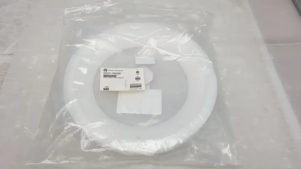 Applied Materials 0021-78086 Plate, Output, Wafer Station 3 in sealed clean-room bag