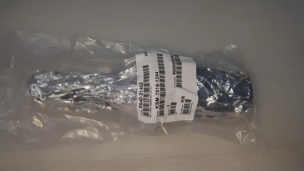 Applied Materials 0040-21402 wafer lift bellows, foil wrapped in a sealed bag with supplier label