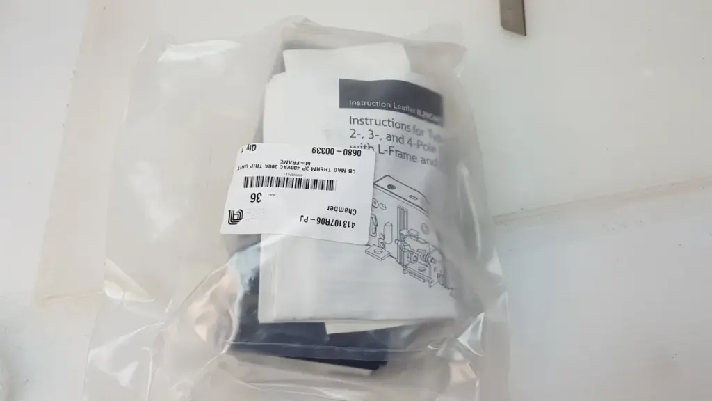 Applied Materials 0680-00339 trip unit sealed in bag with AMAT label and instruction leaflet