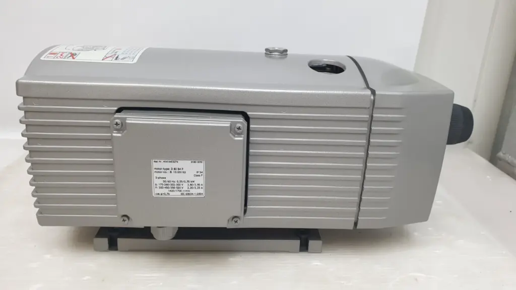 Becker T 4.16 DV oil-less rotary vane pressure/vacuum pump, side view with motor terminal box
