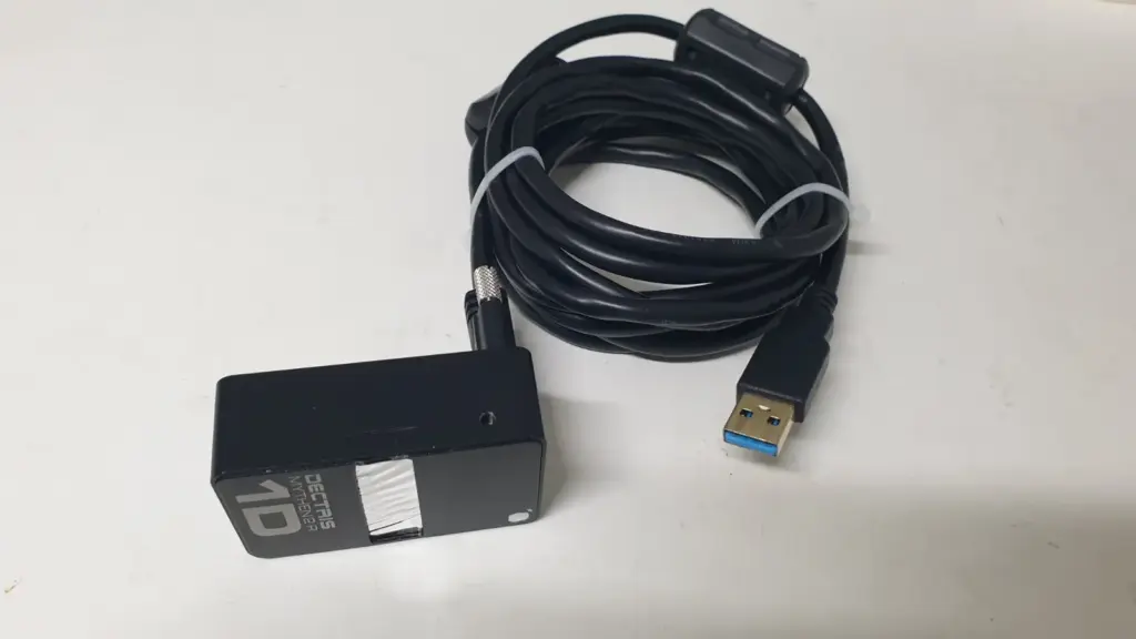 DECTRIS MYTHEN2 R 1D detector module with coiled black USB cable