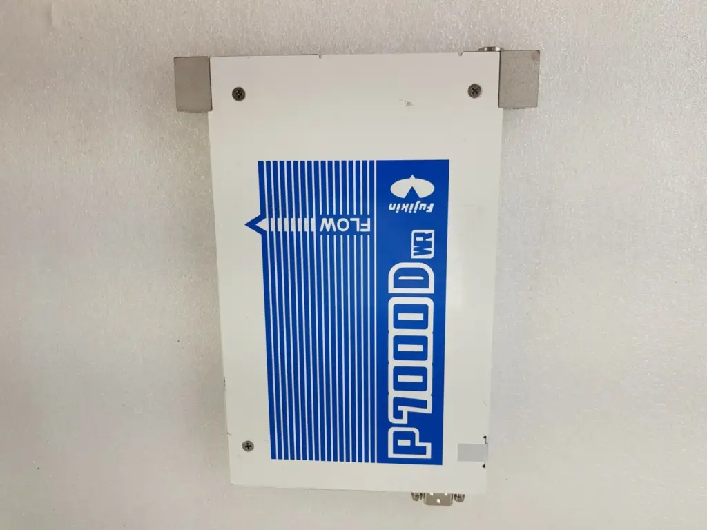 Fujikin P7000D WR flow control system, top cover with flow arrow