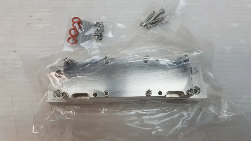 IR Sources laser pump cavity 2400C/102-63R-60L-A in bag with O-rings and screws