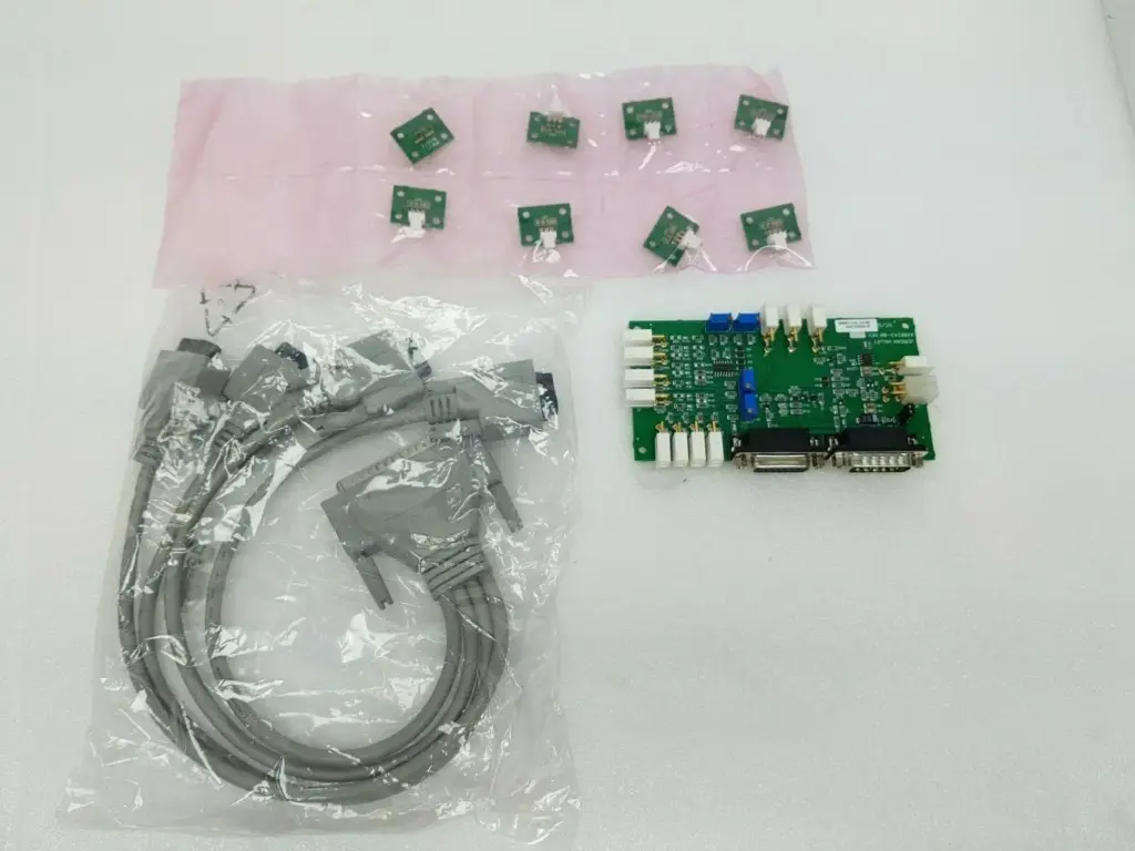 Jordan Valley AY00243-00D board with eight small LD/LDR boards in an anti-static bag and a grey D-sub cable