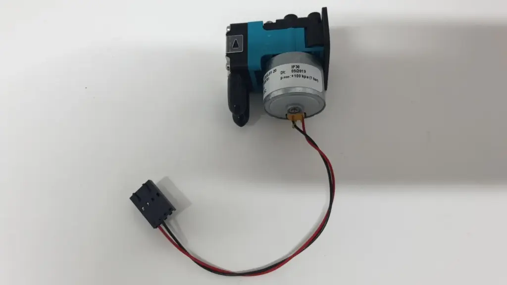 KNF PML 13555-FF 20 12 VDC diaphragm pump with capped ports and red-black lead with connector