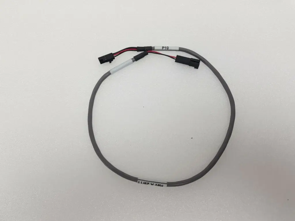 Lumenis HS-0026690 gray cable coiled, red and black leads to two black connectors, P10 tag
