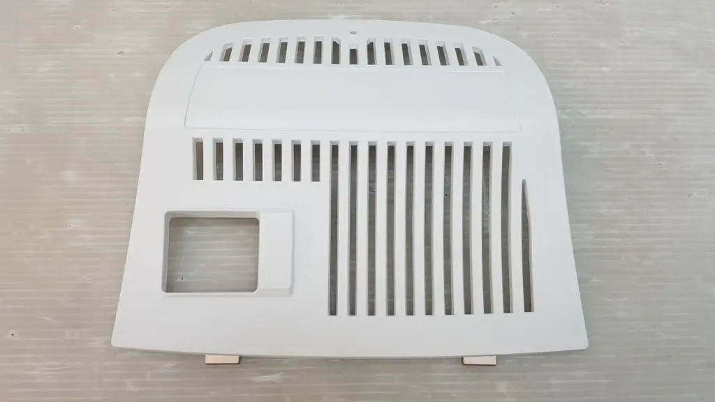 White Lumenis LightSheer Infinity rear plastic cover, outer side with vent slots and cutout