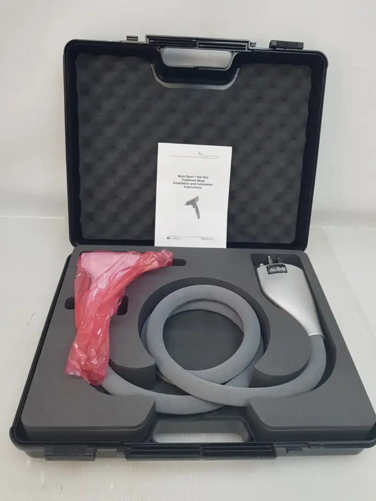 Lumenis Multi-Spot Nd:YAG treatment head in black carry case with installation instructions booklet