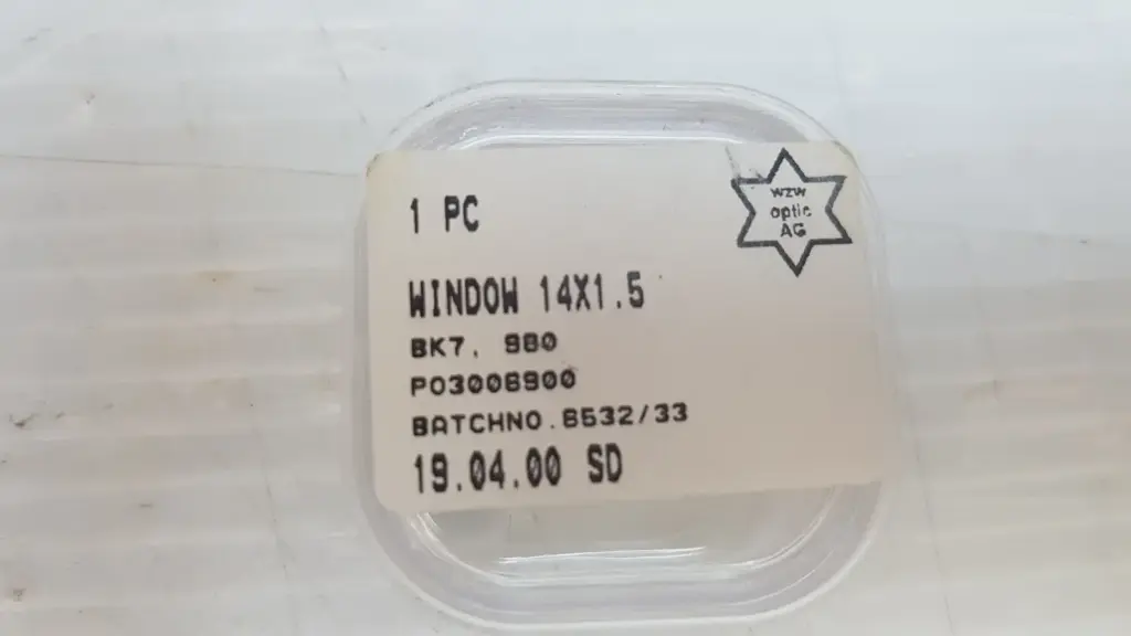 WZW Optic AG label: window 14X1.5, BK7, 980, Lumenis PO3008900, batch 8532/33