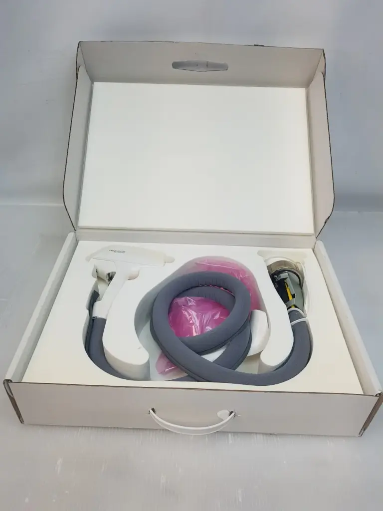 Lumenis ResurFX handpiece with grey umbilical cable and connector in its foam-lined box