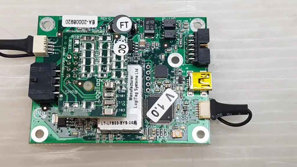 Lumenis SIS board EA-20008920 Rev C with LogiTag 4-channel LF RFID reader module, top view