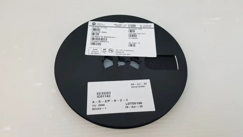 Reel of 2500 Maxim MAX823SEUK+T supervisor ICs with Maxim label and stock label, date code 2217