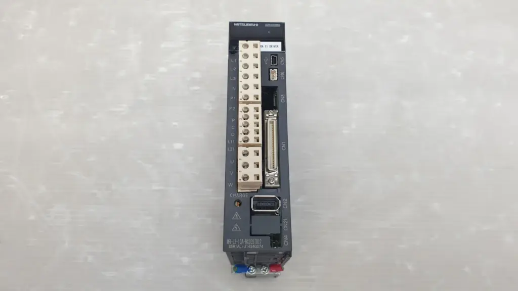 Front of Mitsubishi MR-J3-10A-RX035T012 servo amplifier with terminals and CN1-CN6 connectors