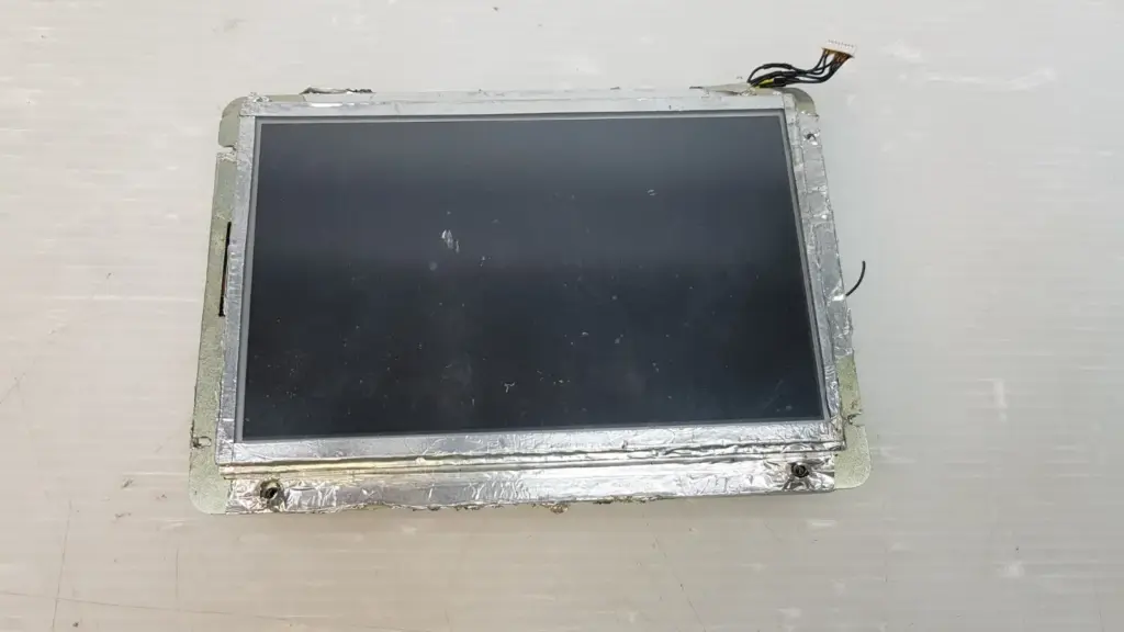 Reach Technology 98-0055-01 LCD touch display in a steel frame with foil-taped edges