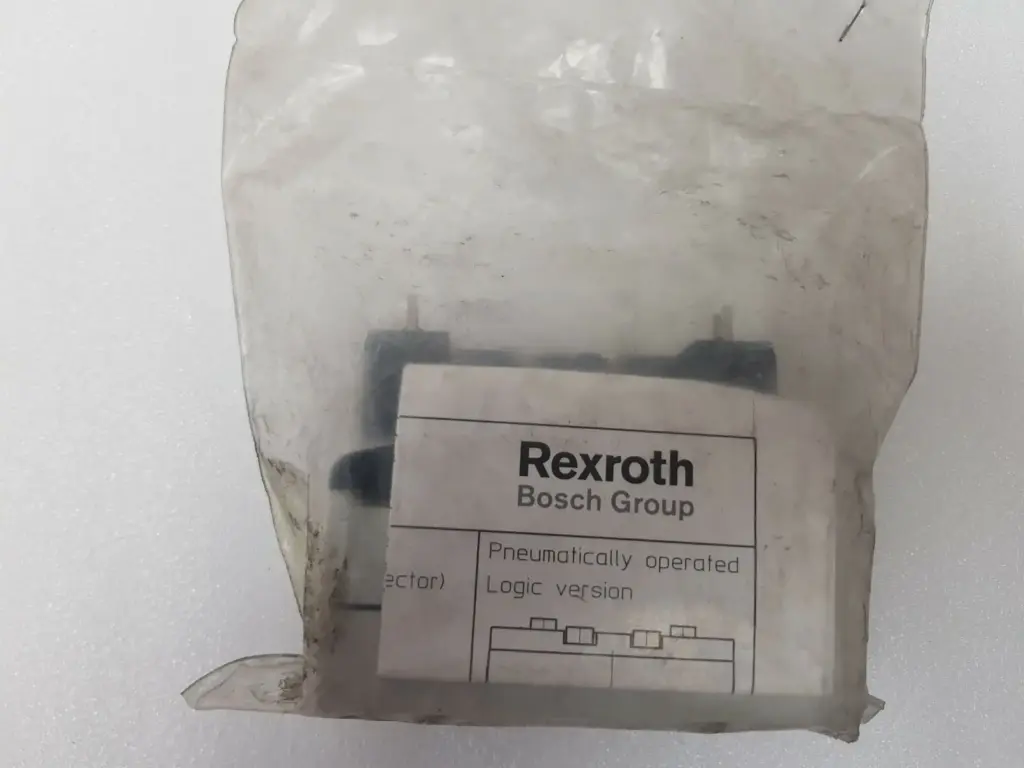 Rexroth 5812561130 valve in its bag with Rexroth Bosch Group leaflet