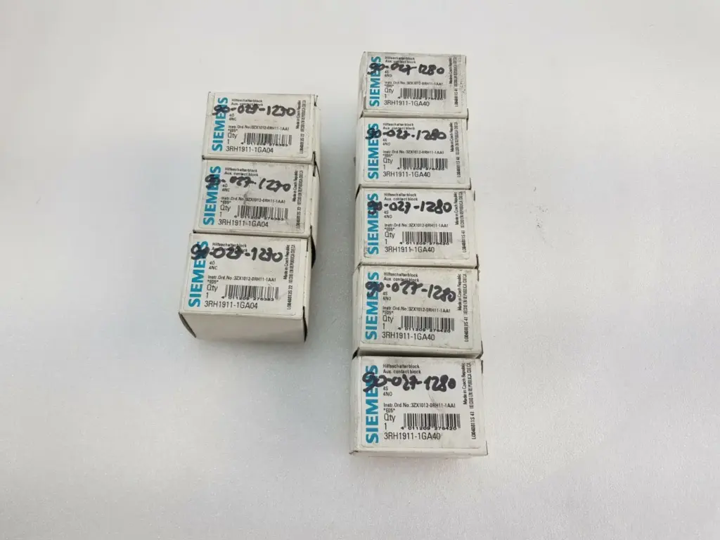 Eight boxed Siemens auxiliary contact blocks: 3RH1911-1GA04 (4NC) and 3RH1911-1GA40 (4NO)
