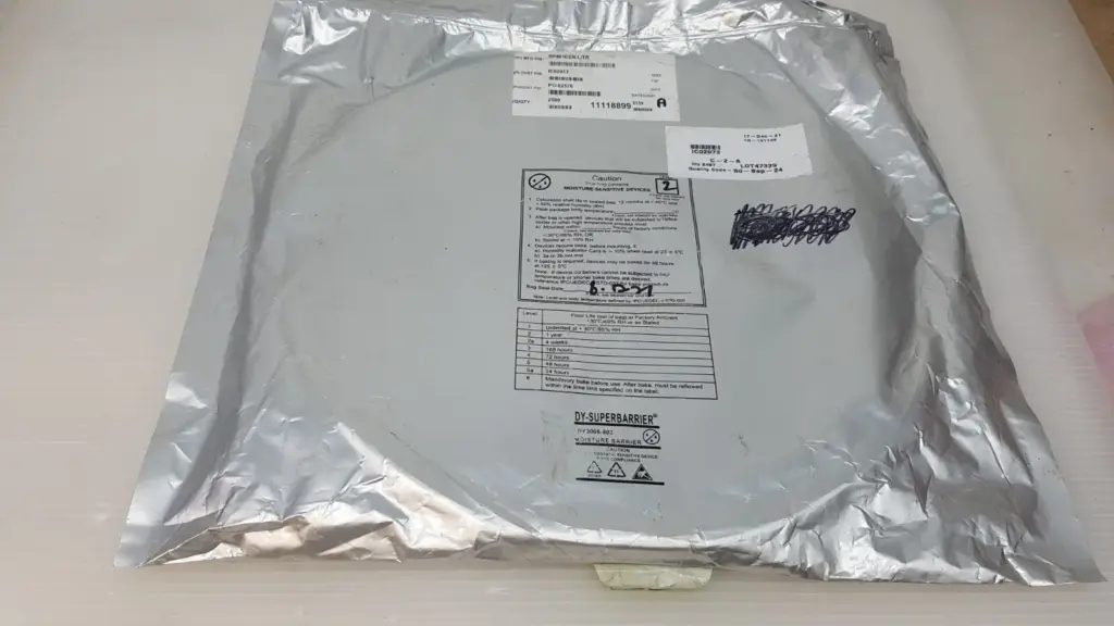 Reel of Sipex SP491EEN-L/TR RS-485 transceivers in a moisture barrier bag with MSL 2 caution label