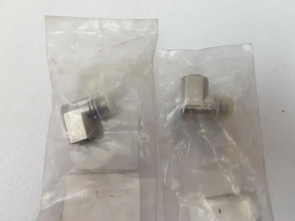 Two Telemecanique ZCE01 rotary limit switch heads in their bags