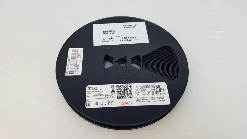 Texas Instruments LM3710XQMM-308/NOPB reel with TI label Qty 1000 and distributor labels