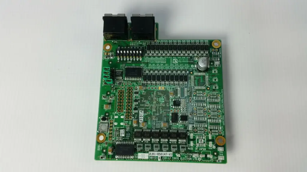 Tokyo Electron 2L81-050147-V2 TAB113-6/I01-LF board, side with two modular jacks and DIP switch